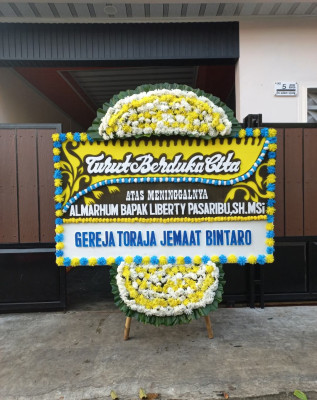 Papan Bunga Duka di Anyar